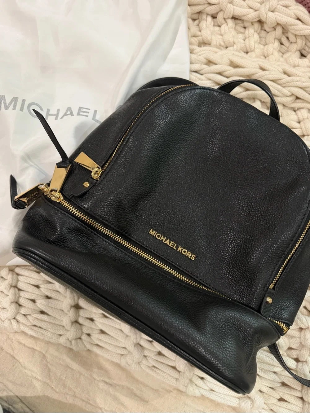 Michael Kors Black Leather Backpack with Gold-Tone Hardware